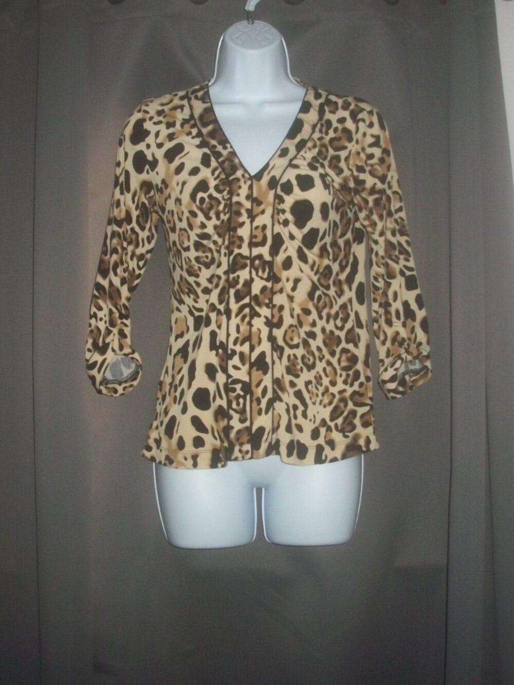 womens leopard print blouse.3/4 sleeves.size small